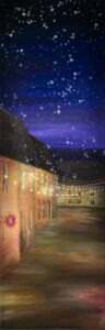 Ein weihnachtlich beleuchtetes Haus vor Nachthimmel, es fallen Schneeflocken