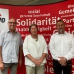 Ulrich Karg, Kathrin Sonnenholzner, UJens Krauße vor der AWO Wand