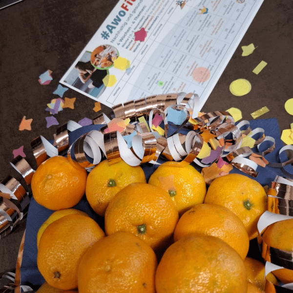Wohlfühllabor_viele frische Orangen mit Partydeko